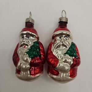 Two Santa Holding Tree Small Christmas Ornaments Blown Glass 2.5” Tall